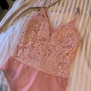 Purple lace body suit